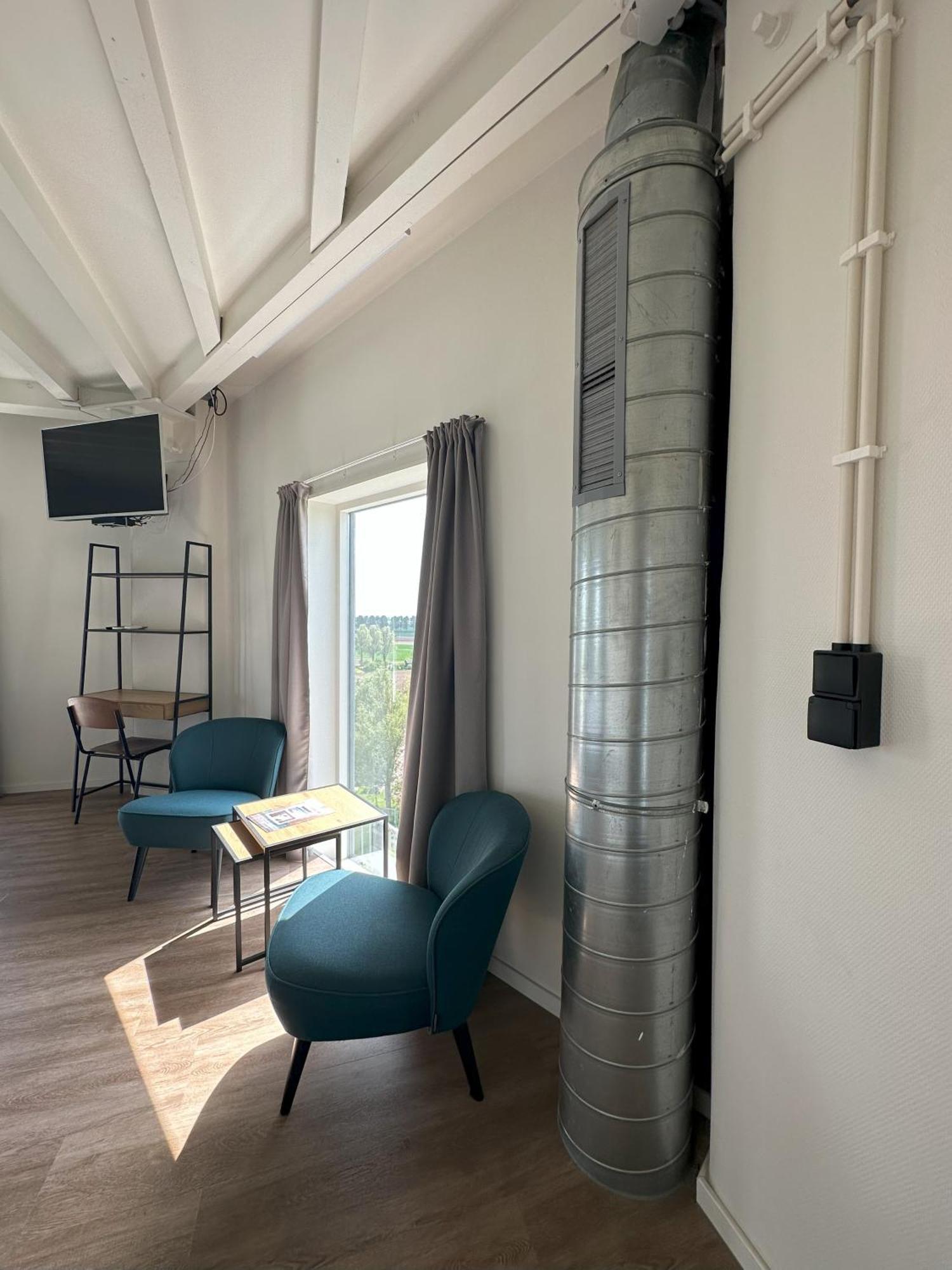 דורדרכט Hotel De Watertoren מראה חיצוני תמונה